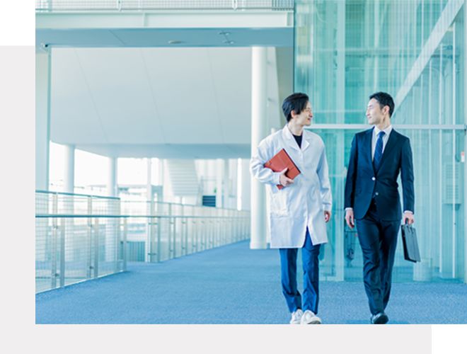 医師とビジネスマンの相談風景